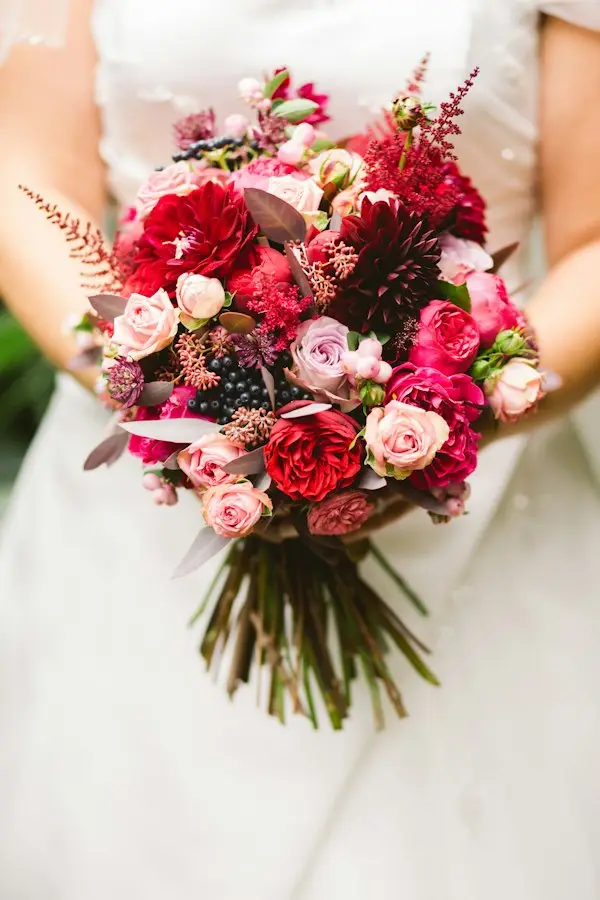 A bride holding her wedding bouquet
