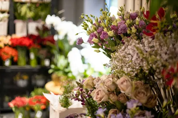 A white and purple sympathy bouquet