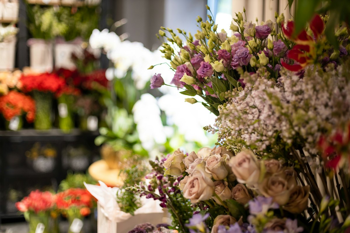 A white and purple sympathy bouquet